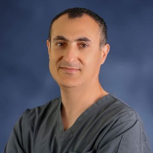 A Man Wearing A Blue Shirt