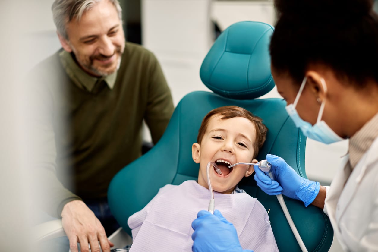 Dentist treating a child
