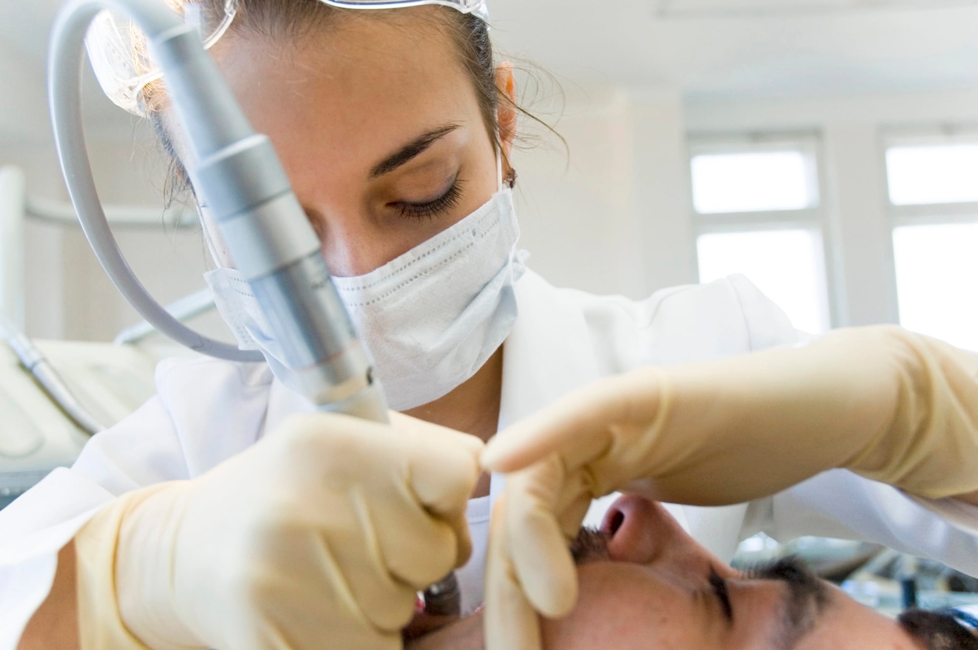 emergency dentist novi mi helping patient