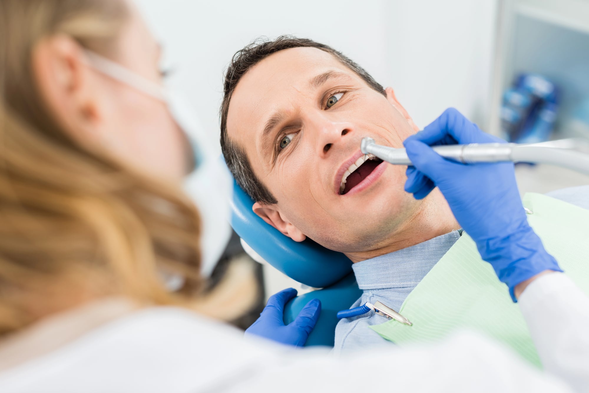 man visiting dentist detroit