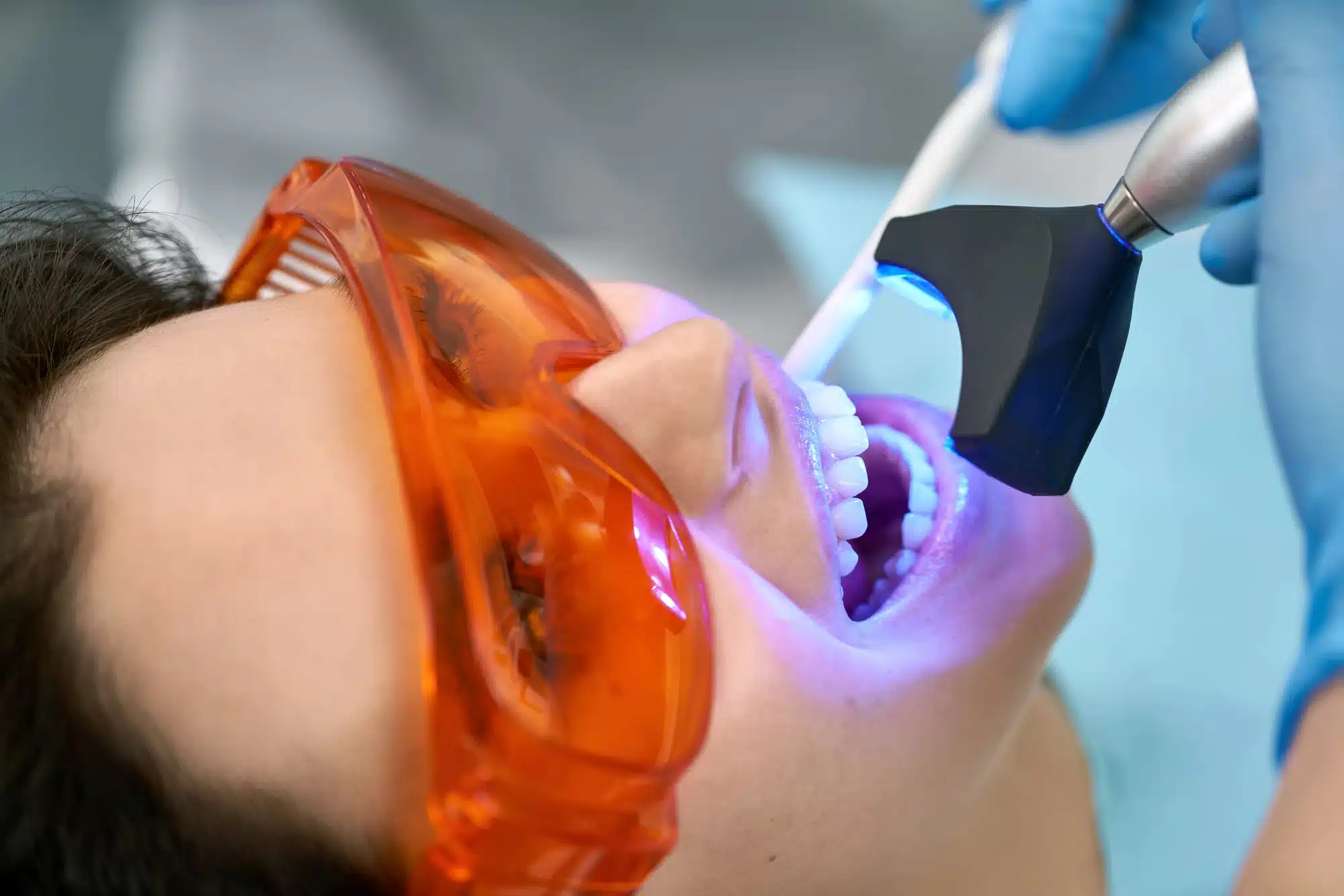 woman at Cosmetic dentist novi mi getting whitening