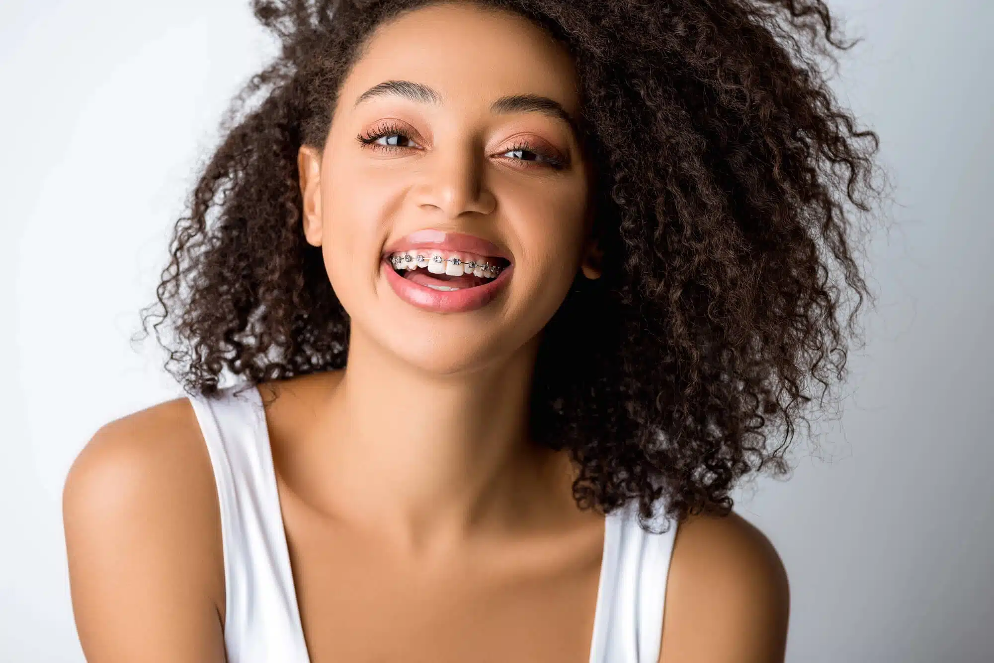 Girl smiling with Braces Novi, detroit