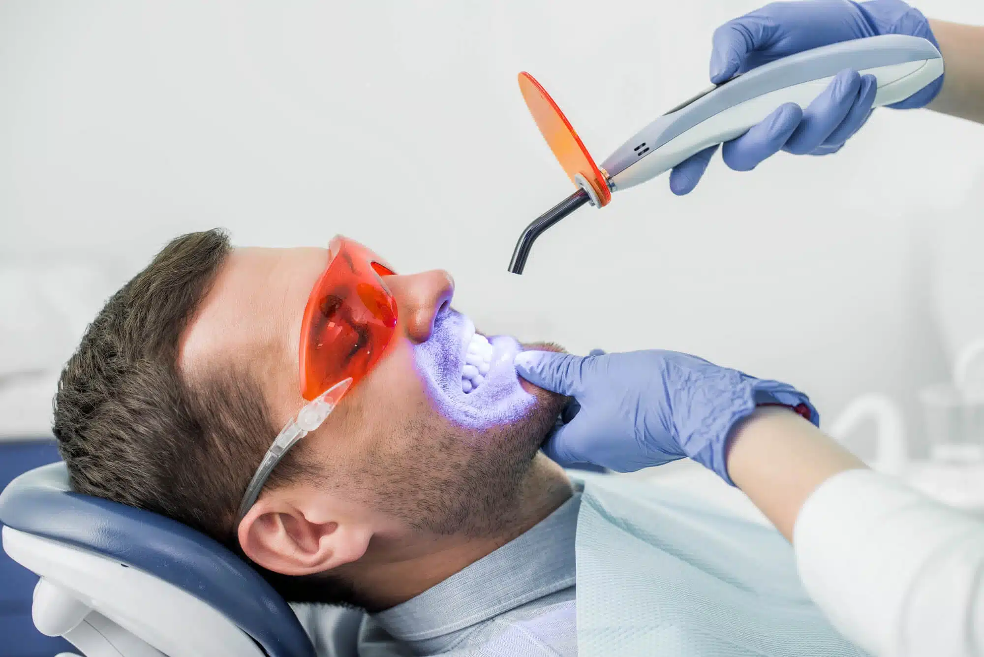 Man undergoing teeth whitening detroit
