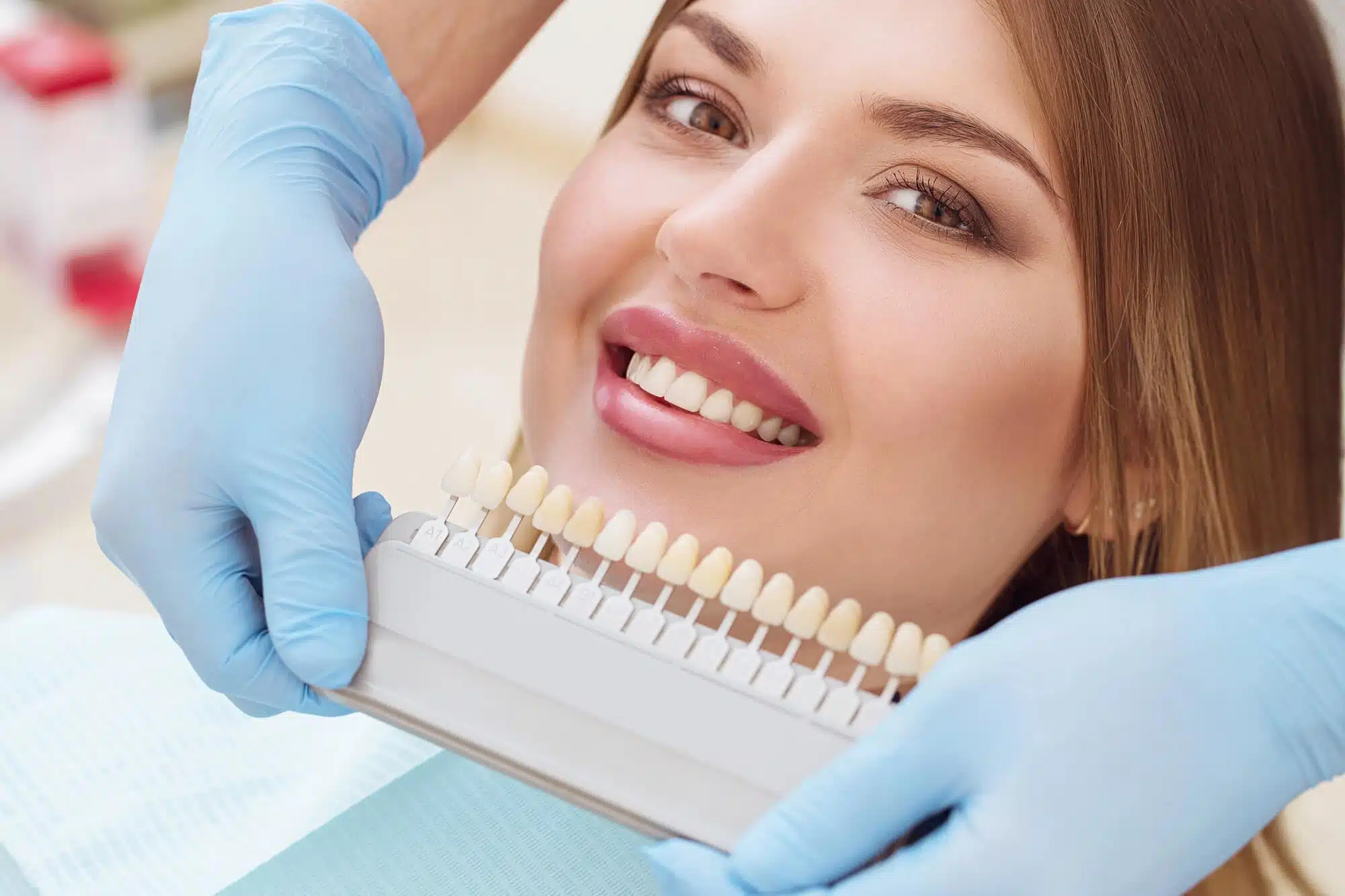 Woman smiling after teeth whitening detroit