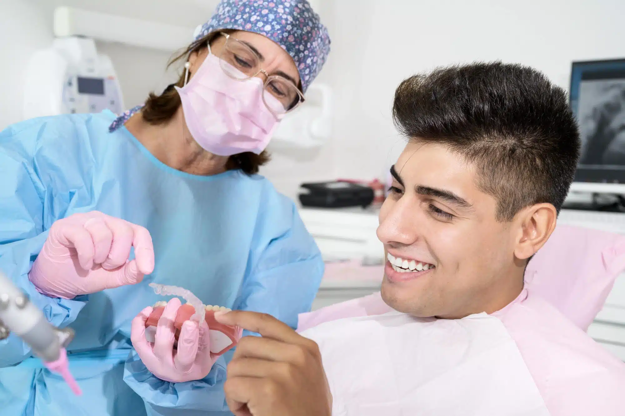 Patient checking his Invisalign novi